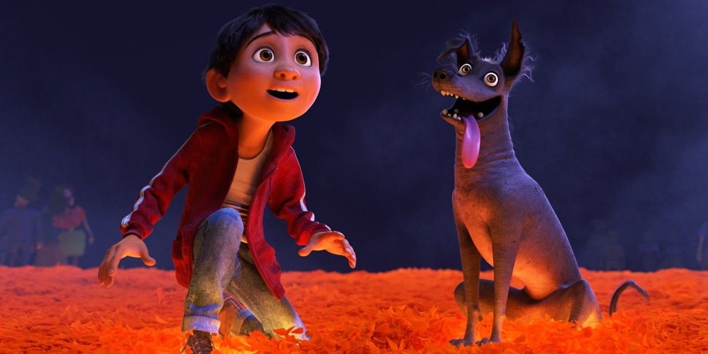 Miguel and Dante look on in the land of the dead in Coco