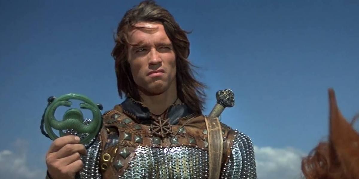 Arnold Schwarzenegger wearing armor in Conan the Barbarian