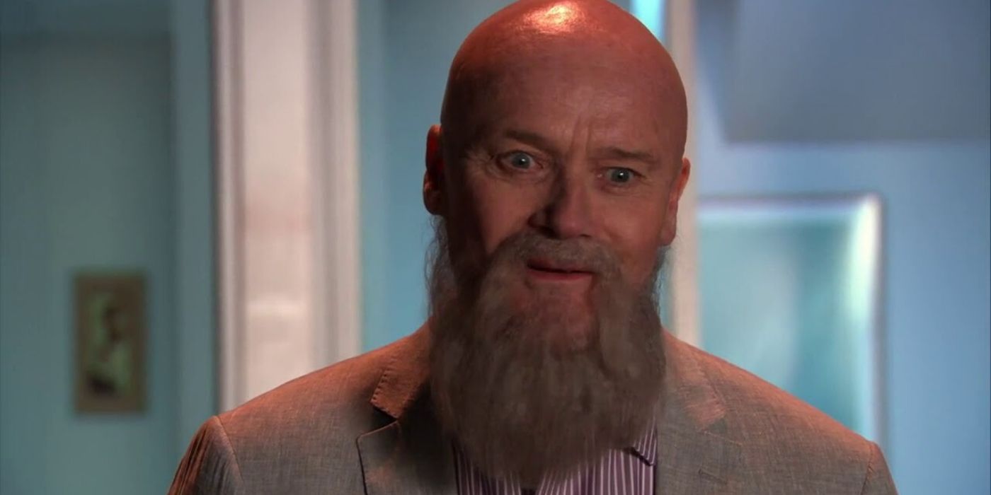 Creed with a beard and shaved head on The Office