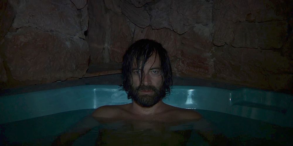 Mark Duplass in a bathtub looking at a camera in Creep 2
