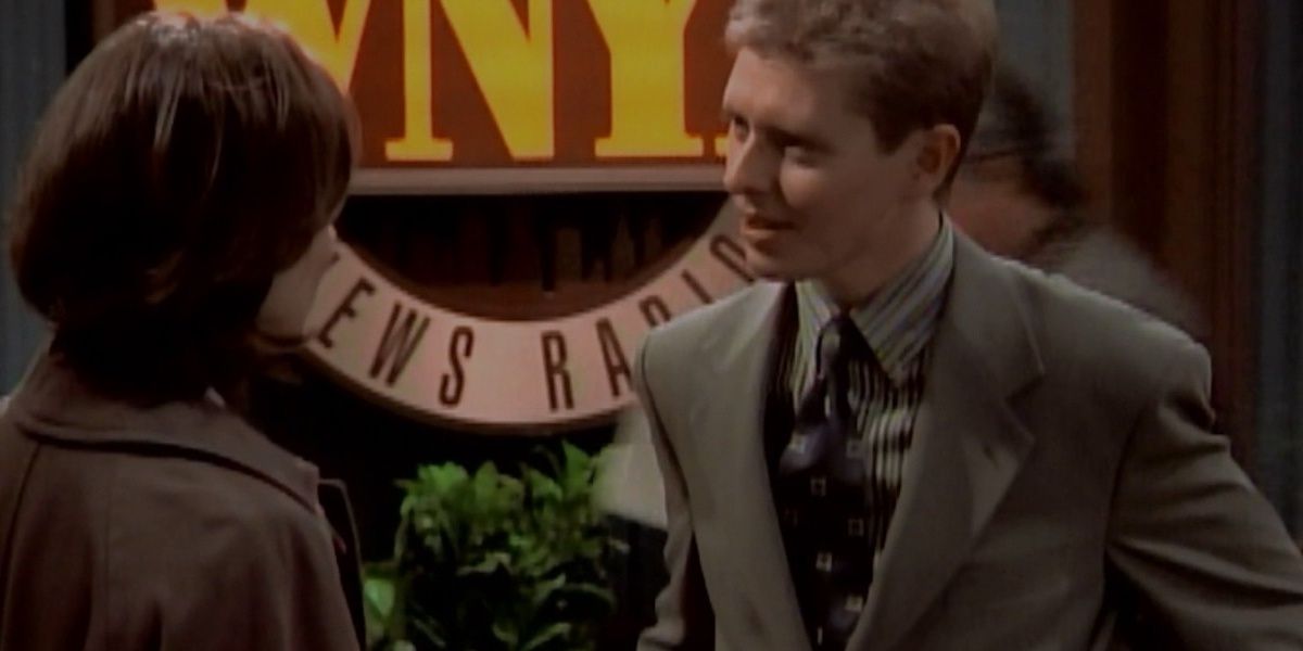 A man and woman talk in NewsRadio