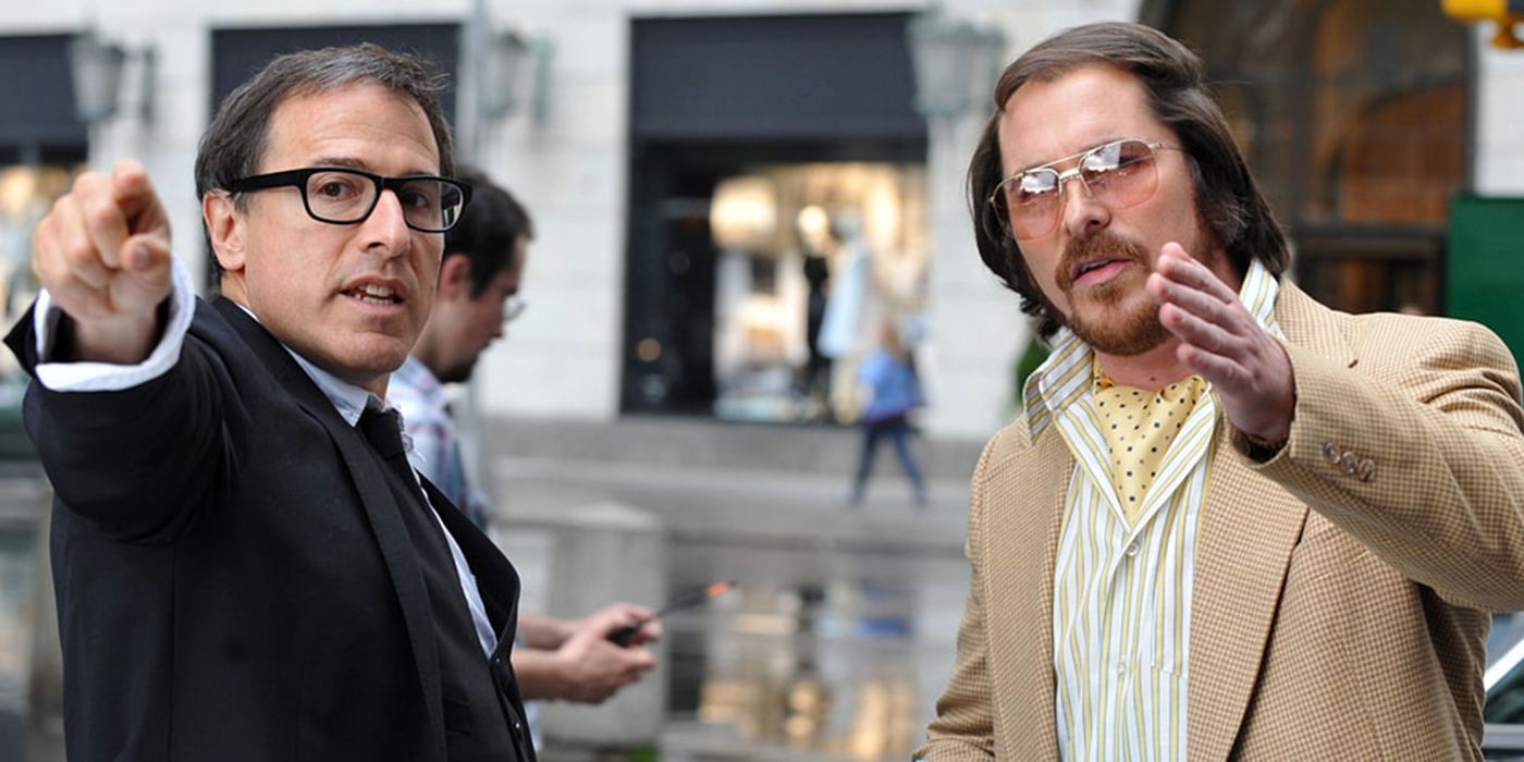 David O Russell and Christian Bale on the set of American Hustle
