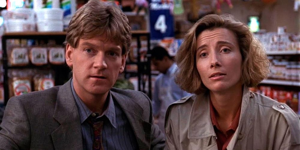 Kenneth Branagh and Emma Thompson stand in a store in Dead Again (1991)