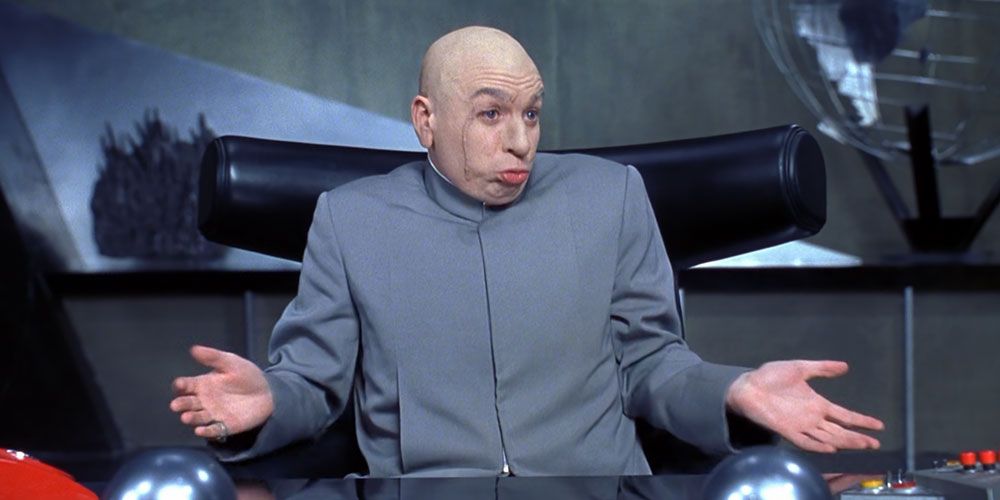 Dr. Evil shrugging and pursing his lips in a scene from Austin Powers.