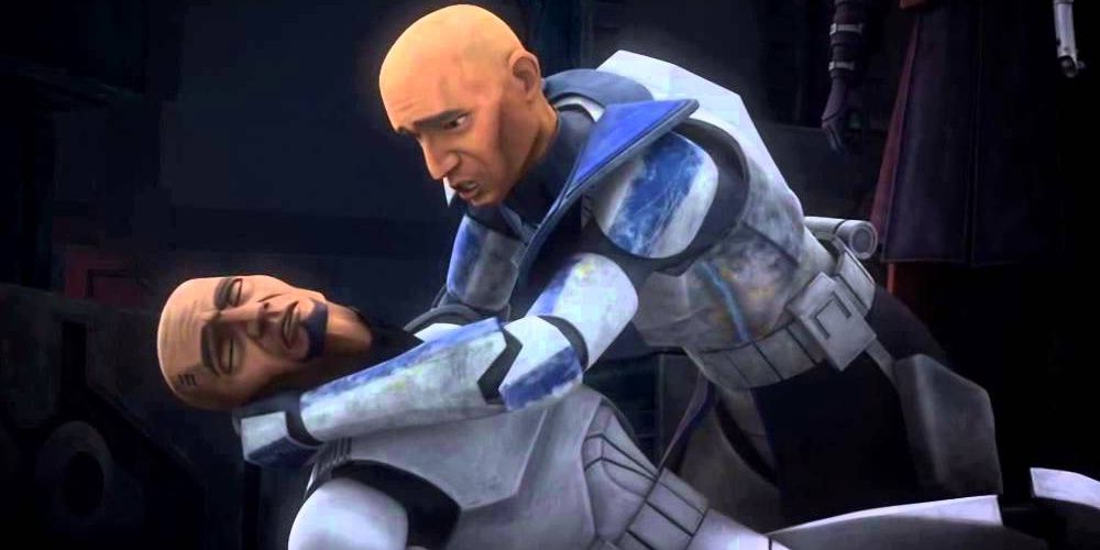 Rex holds Fives as he dies trying to reveal the clone conspiracy in Star Wars The Clone Wars
