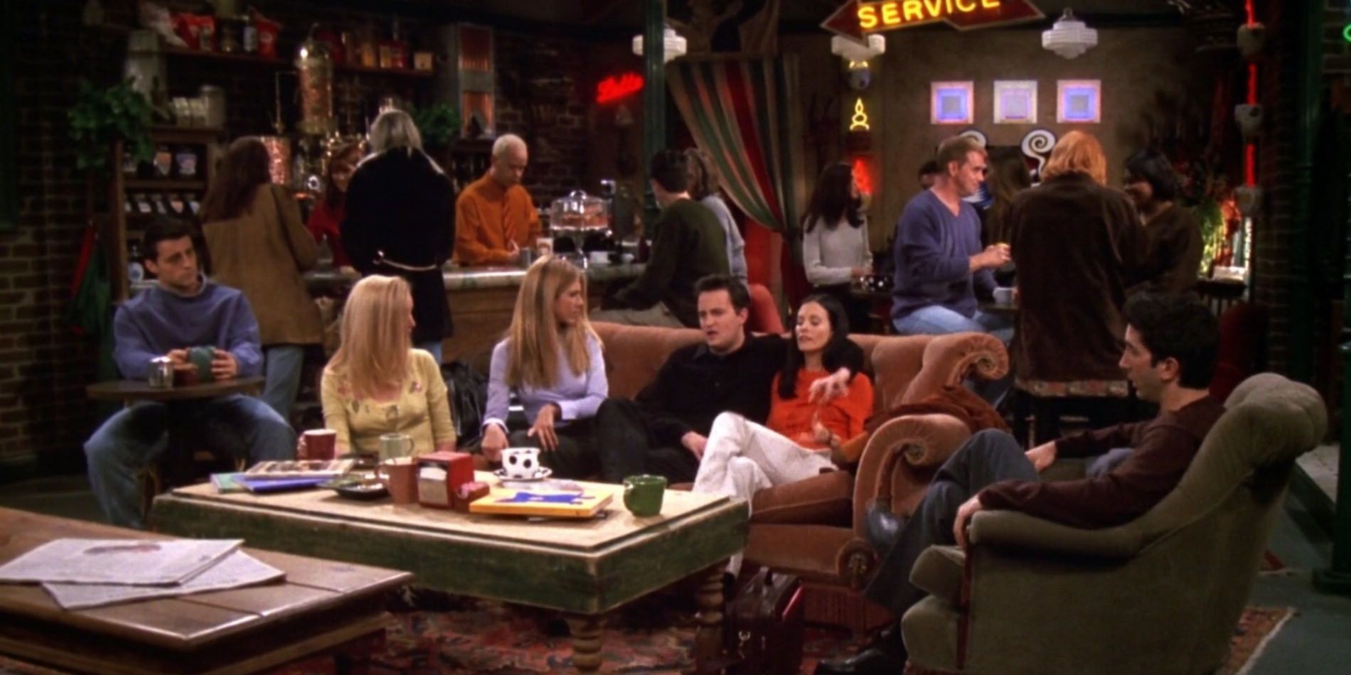 The Friends sitting together in Central Perk.