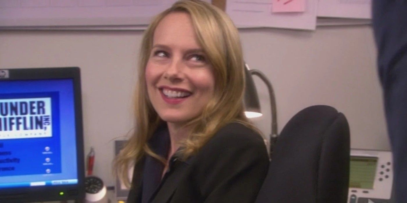 Holly smiling at her desk on The Office