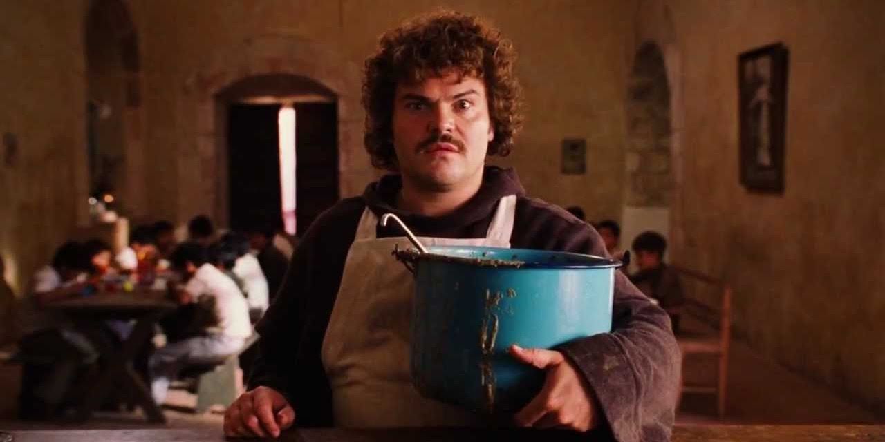 Ignacio holding a pot of soup in the 2006 comedy Nacho Libre.
