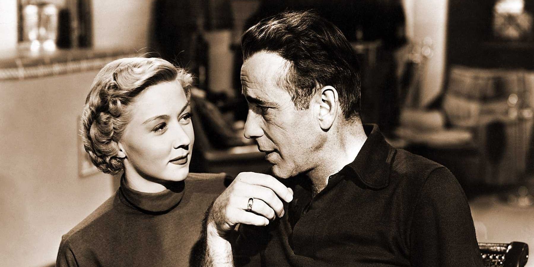 A man and woman talk from In a Lonely Place 