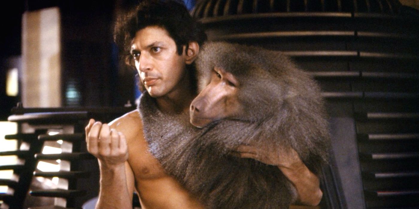 Jeff Goldblum with a monkey in The Fly