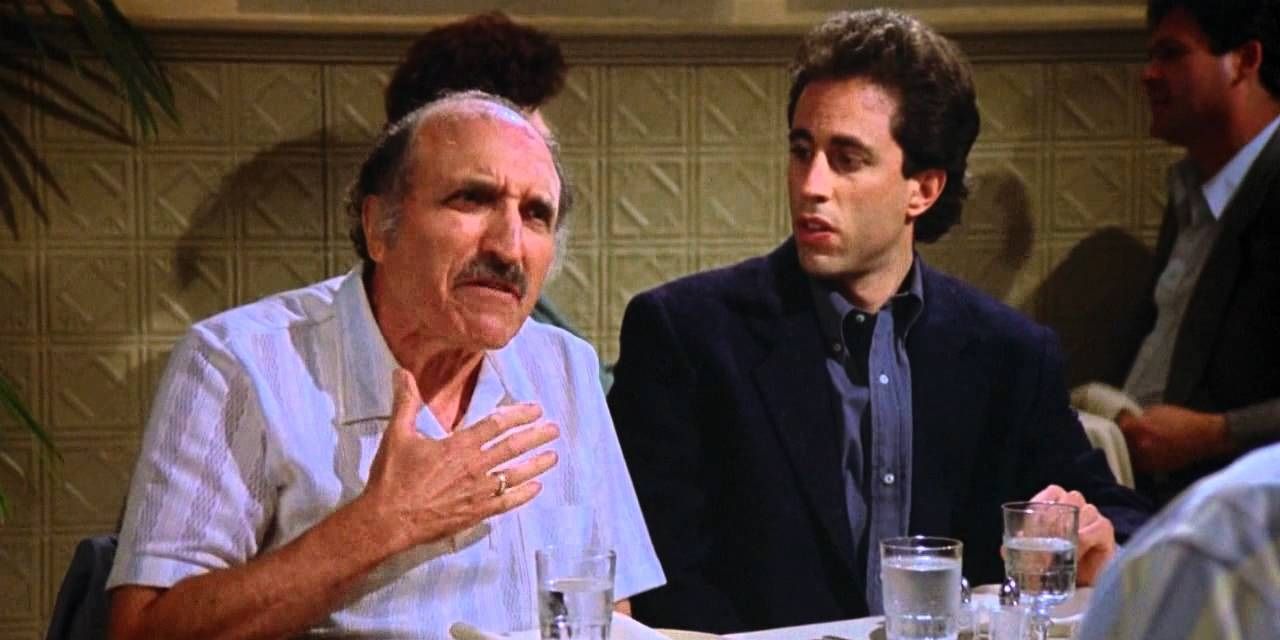 Uncle Leo and Jerry sitting at dinner on Seinfeld