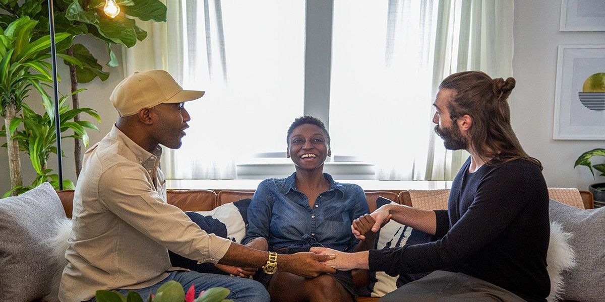 jess guilbreaux queer eye with karamo and jonathan talking in living room