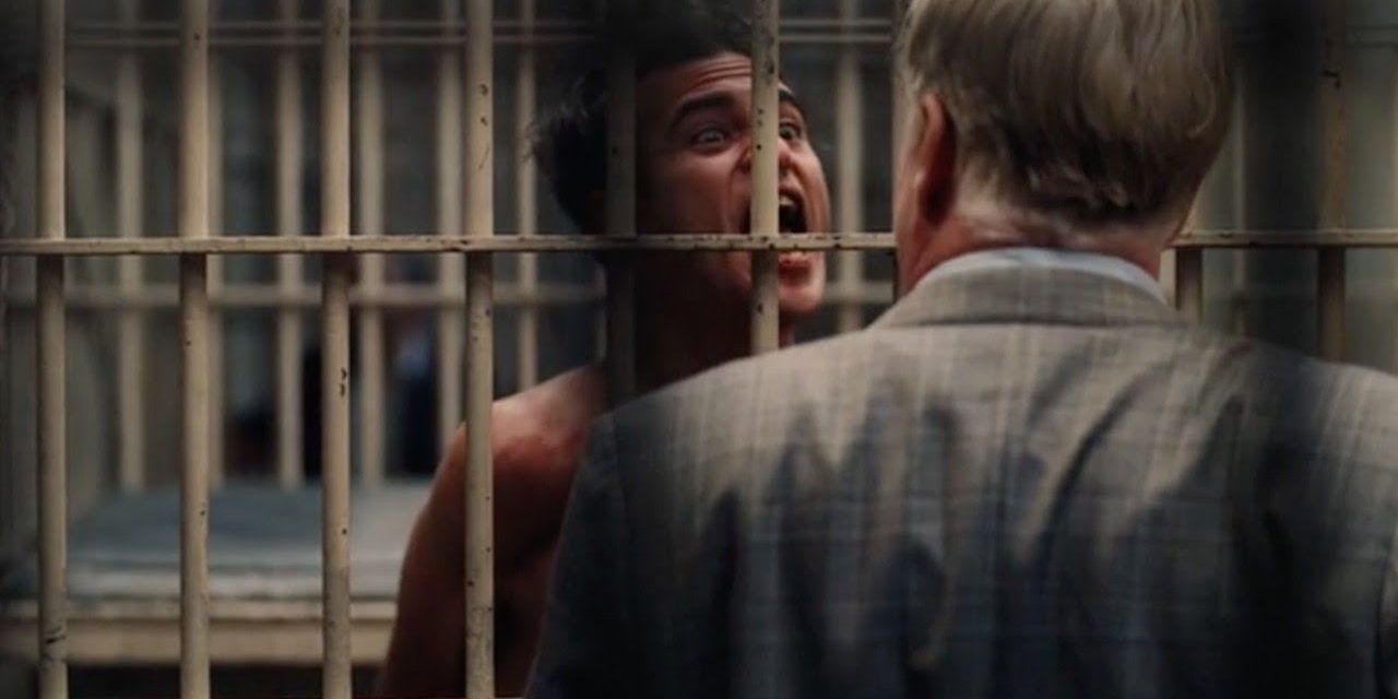 Freddie screams at Lancaster in a prison cell in The Master