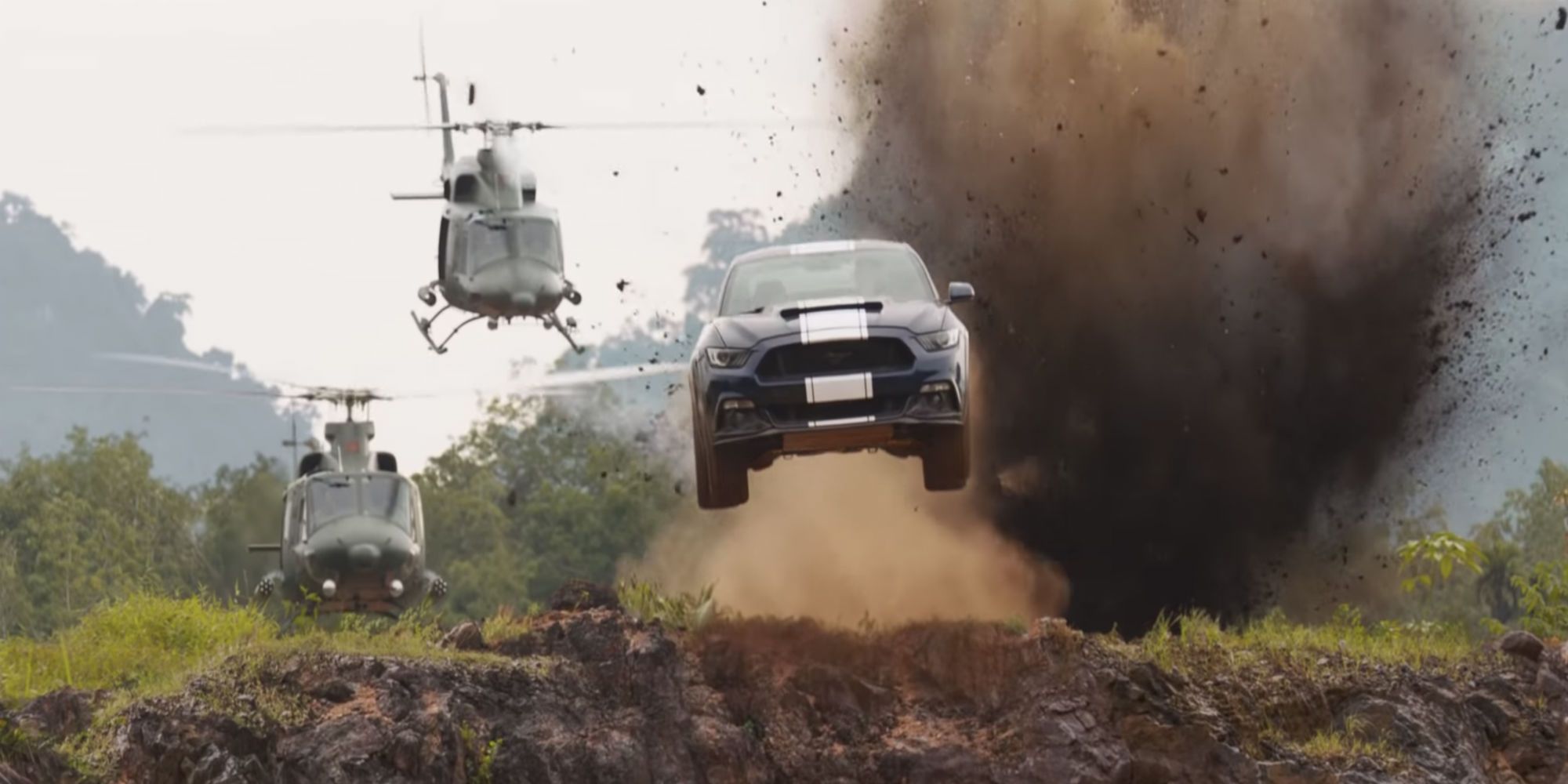 Two helicopters chase a car through a minefield in Fast and Furious 9