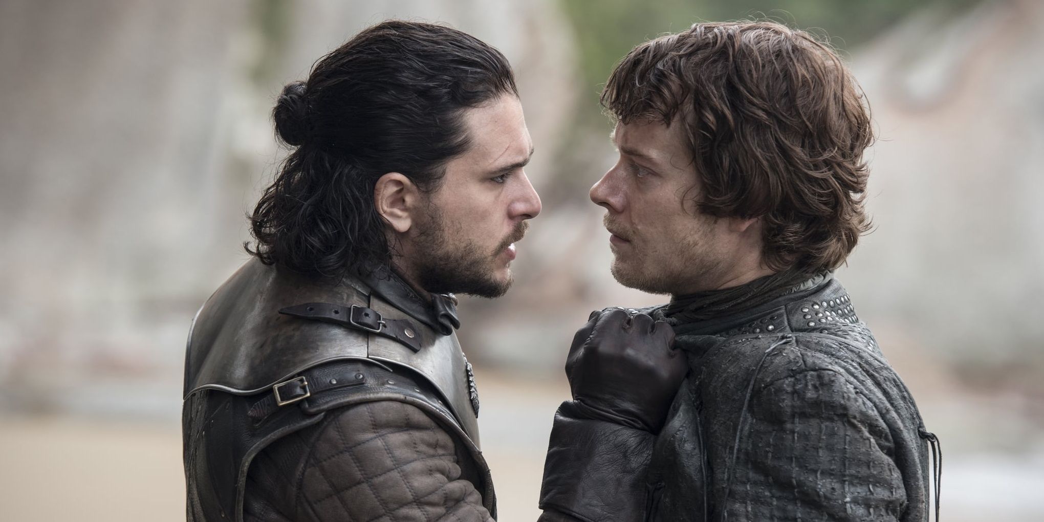 Jon Snow grabs Theon Greyjoy in Game of Thrones