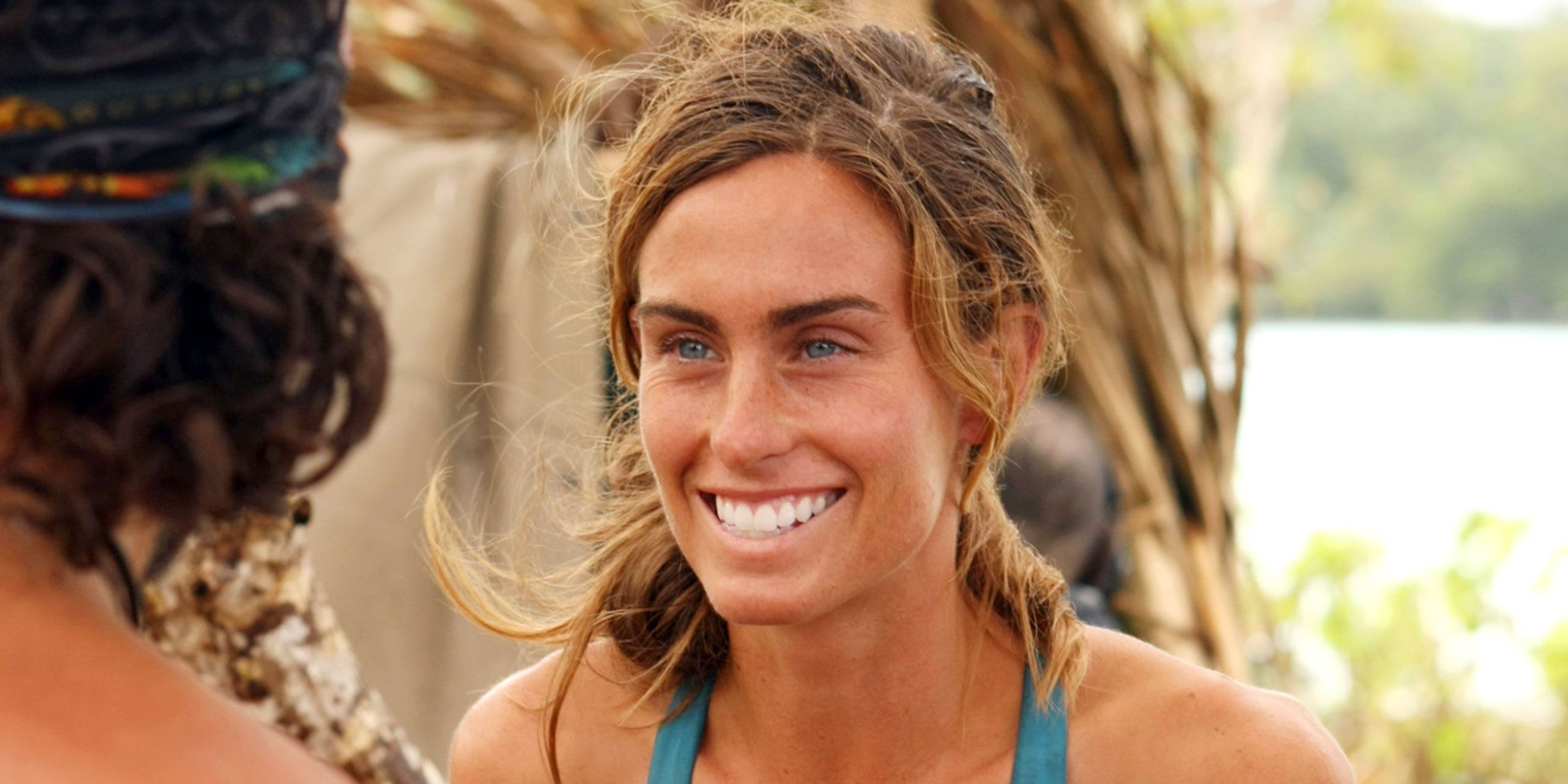 Kim Spradlin grinning in Survivor