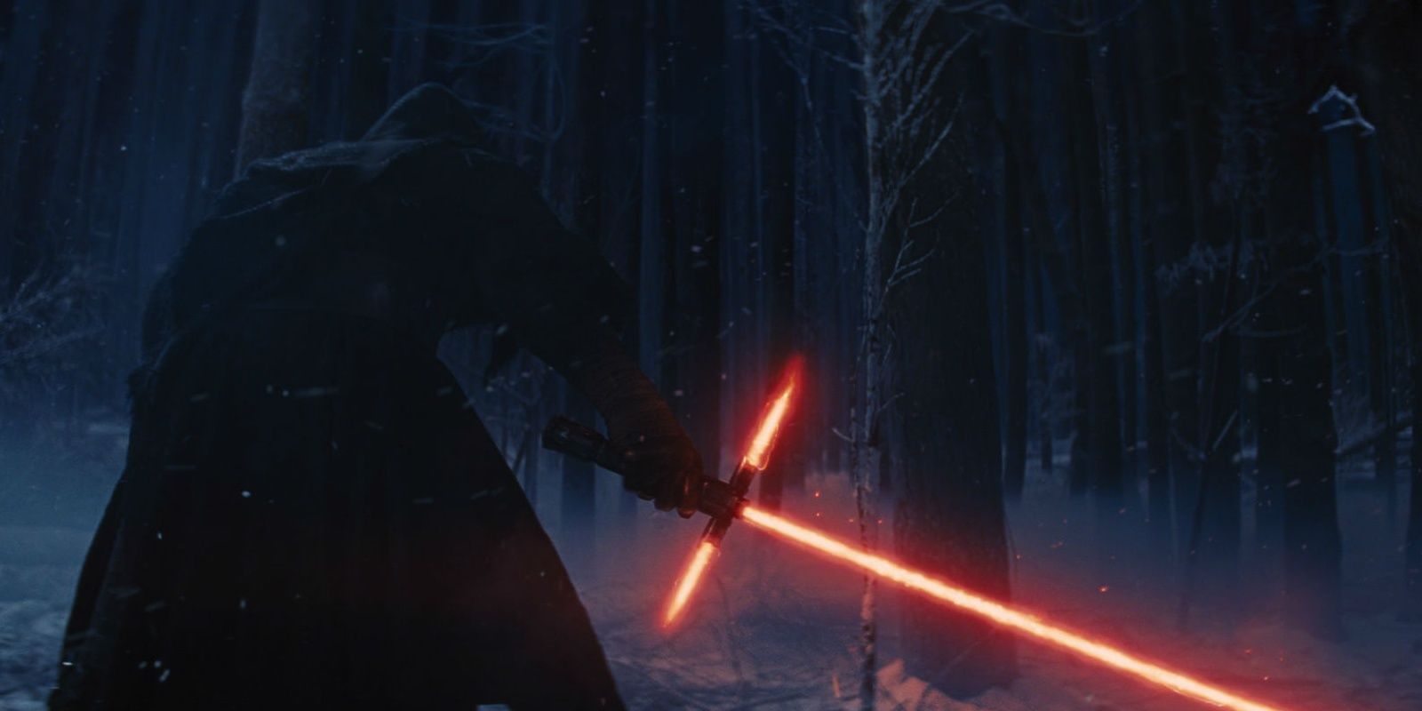Kylo Ren ignites his lightsaber in The Force Awakens.