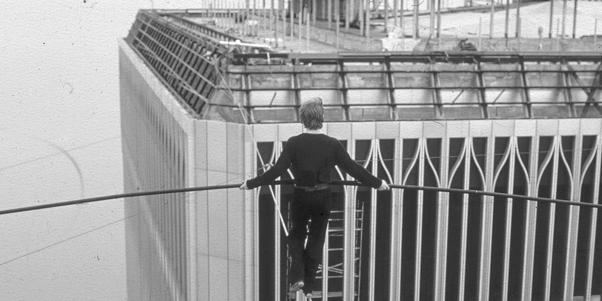 Philippe Petit crossing the twin towers through a wire