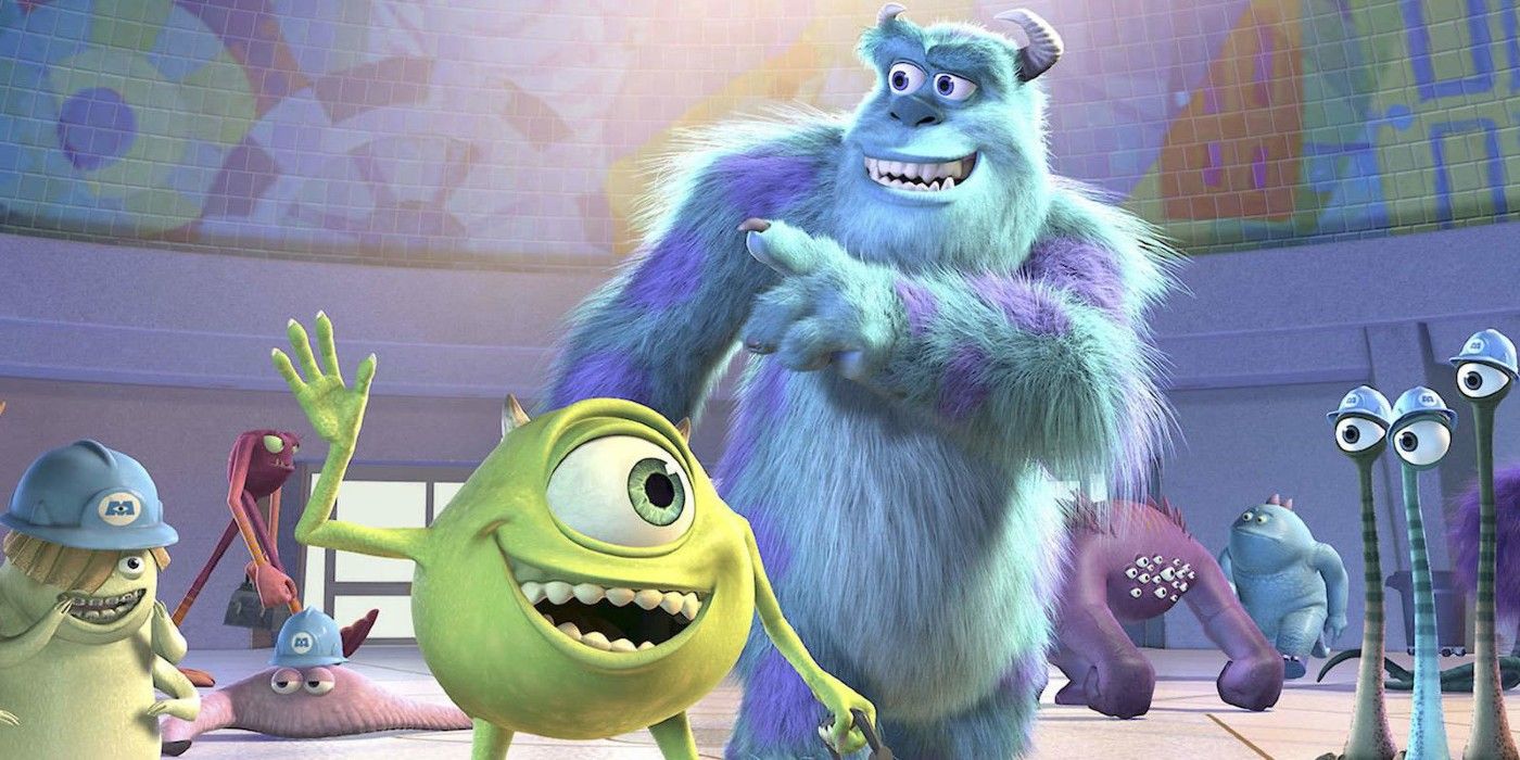 Mike y Sully sonriendo y saludando en Monsters, Inc.