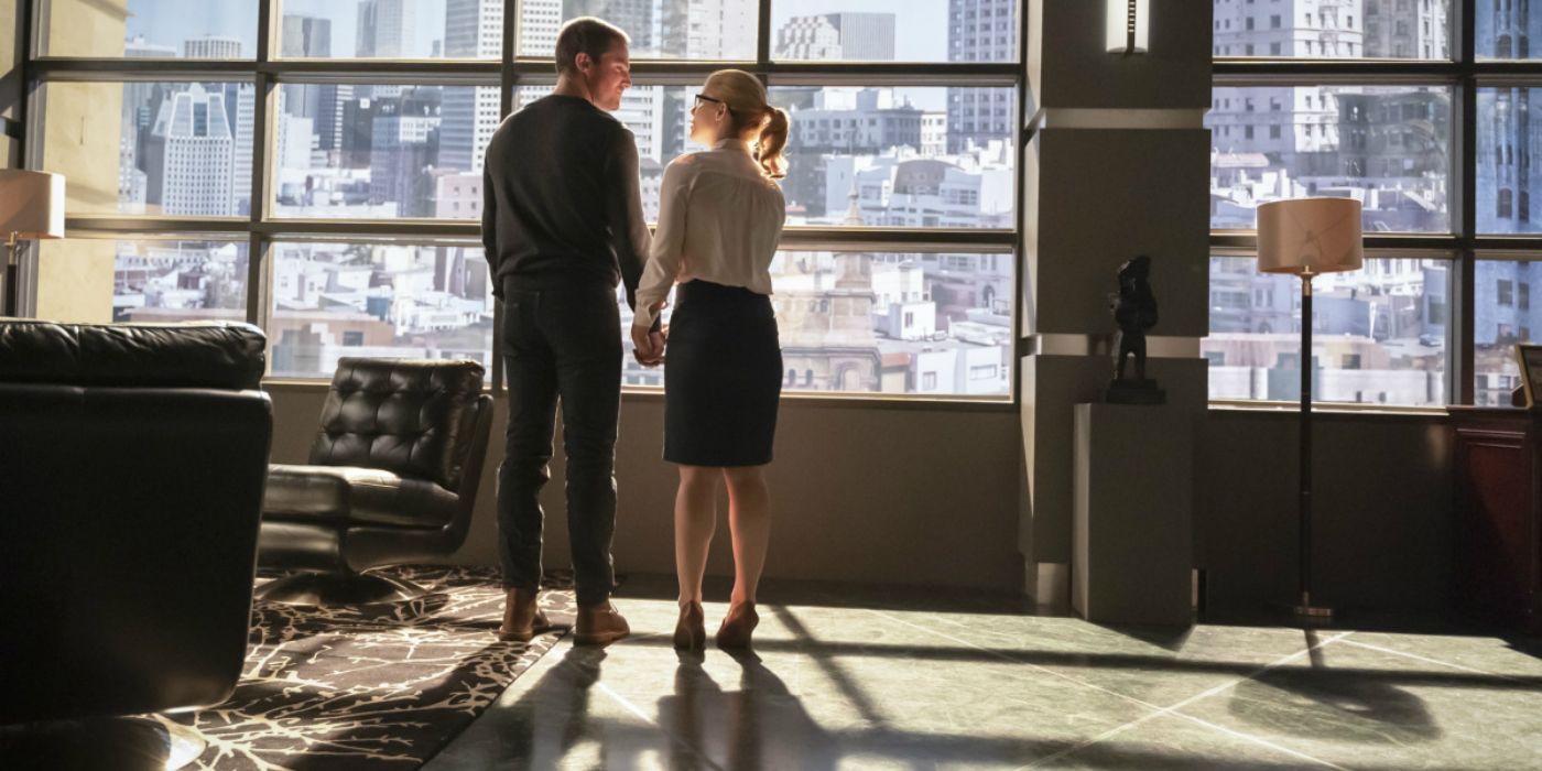Oliver and Felicity hold hands