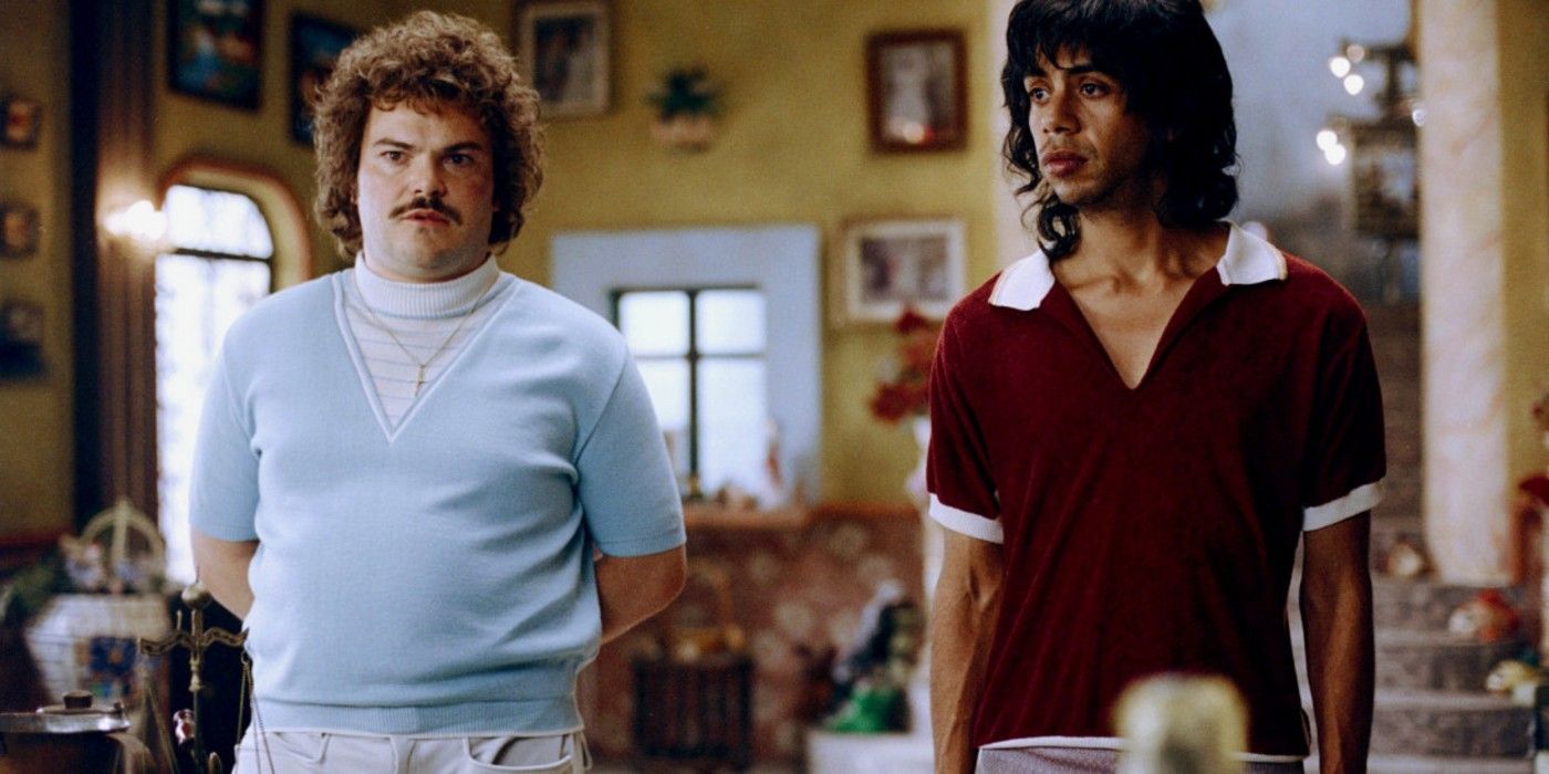 Jack Black and Hector Jimenez standing together in Nacho Libre.