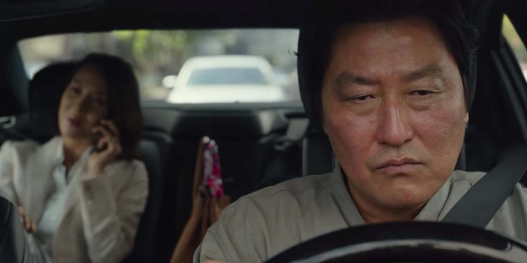 Song Kang Ho driving a car in Parasite