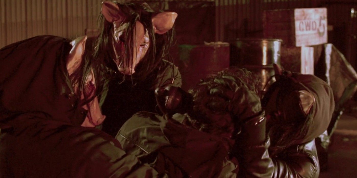 Pigheads attaching a person in Saw 3D