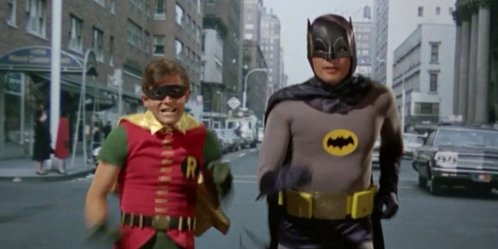 Batman and Robin run through the street in Batman 1966