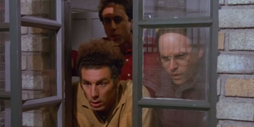 Kramer, Jerry and George looking out the window in Seinfeld