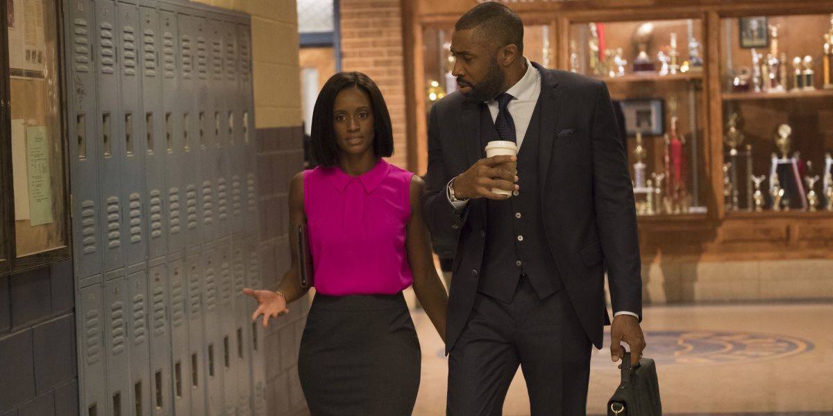 Skye P. Marshall as Ms. Fowdy and Cress Williams as Jefferson Pierce in Black Lightning