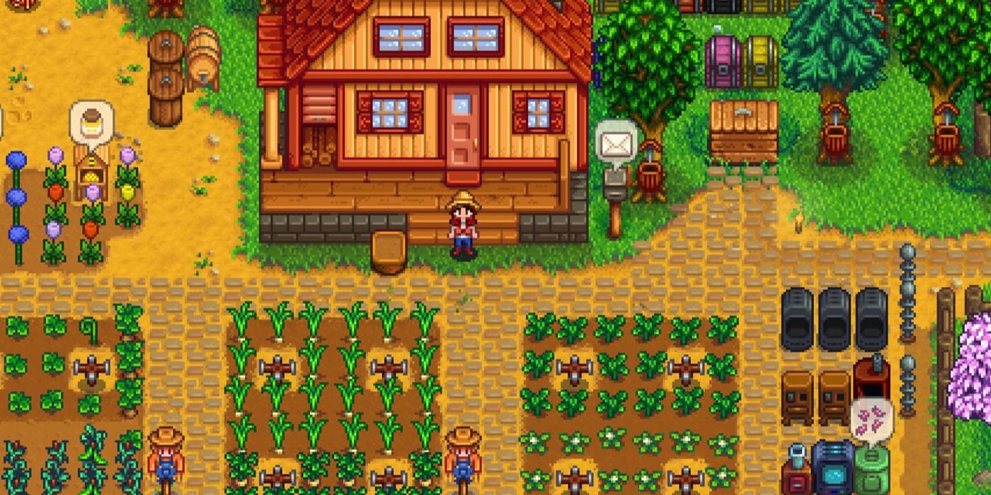 A farm in Stardew Valley. The player is standing in front of a field of vegetables.