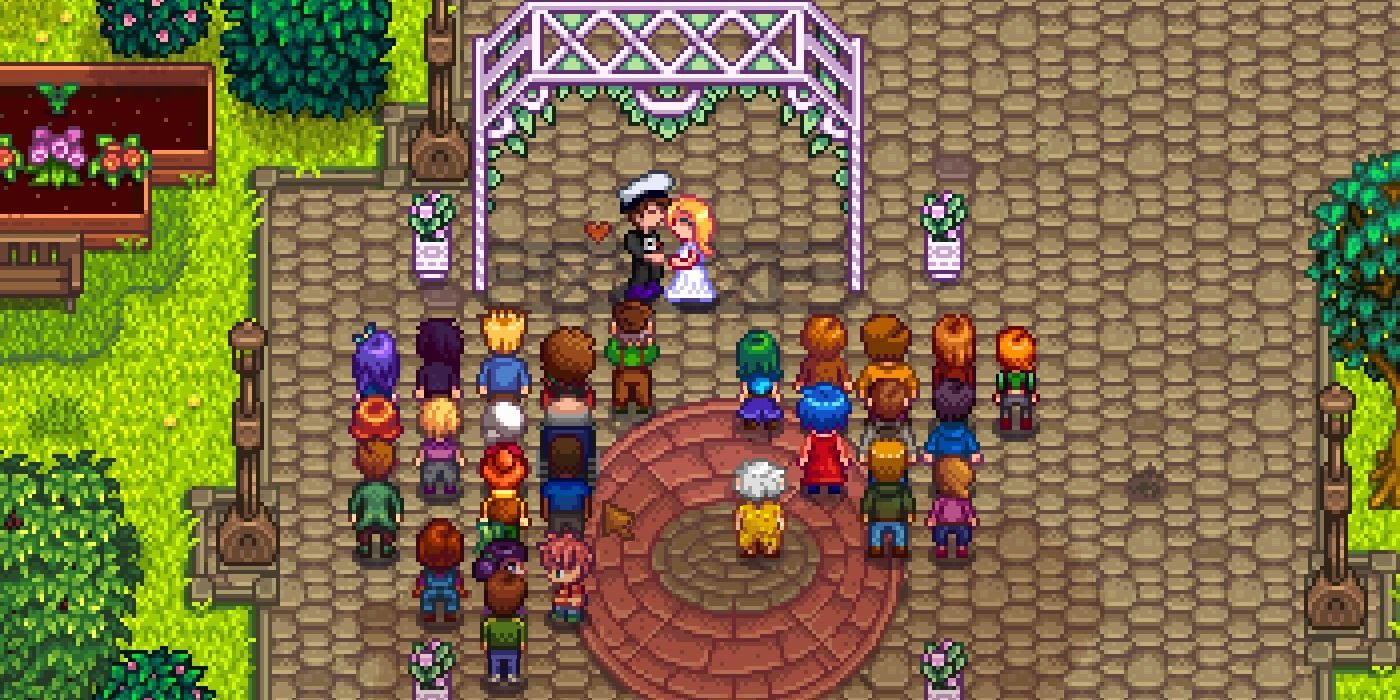 A wedding in Stardew Valley, the bride and groom kissing as townsfolk look on