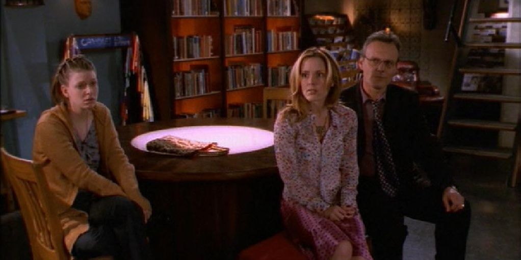 Tara, Anya, and Giles in the Magic Box in Buffy the Vampire Slayer