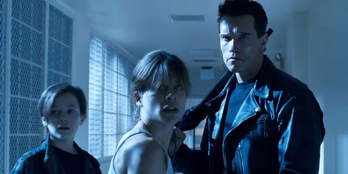 The Terminator, Sarah Connor, and John Connor stand in Terminator 2: Judgment DayTerminator 2 Judgment Day Header