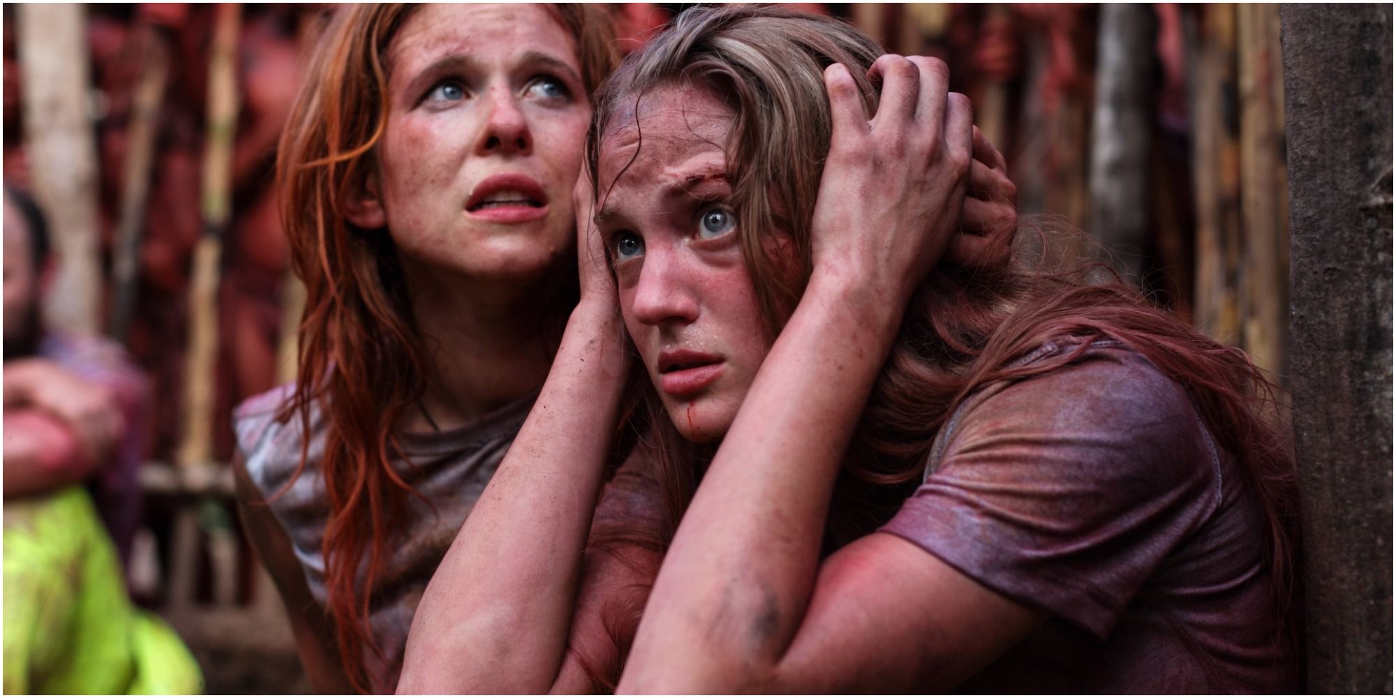 Two students cower in The Green Inferno 2014