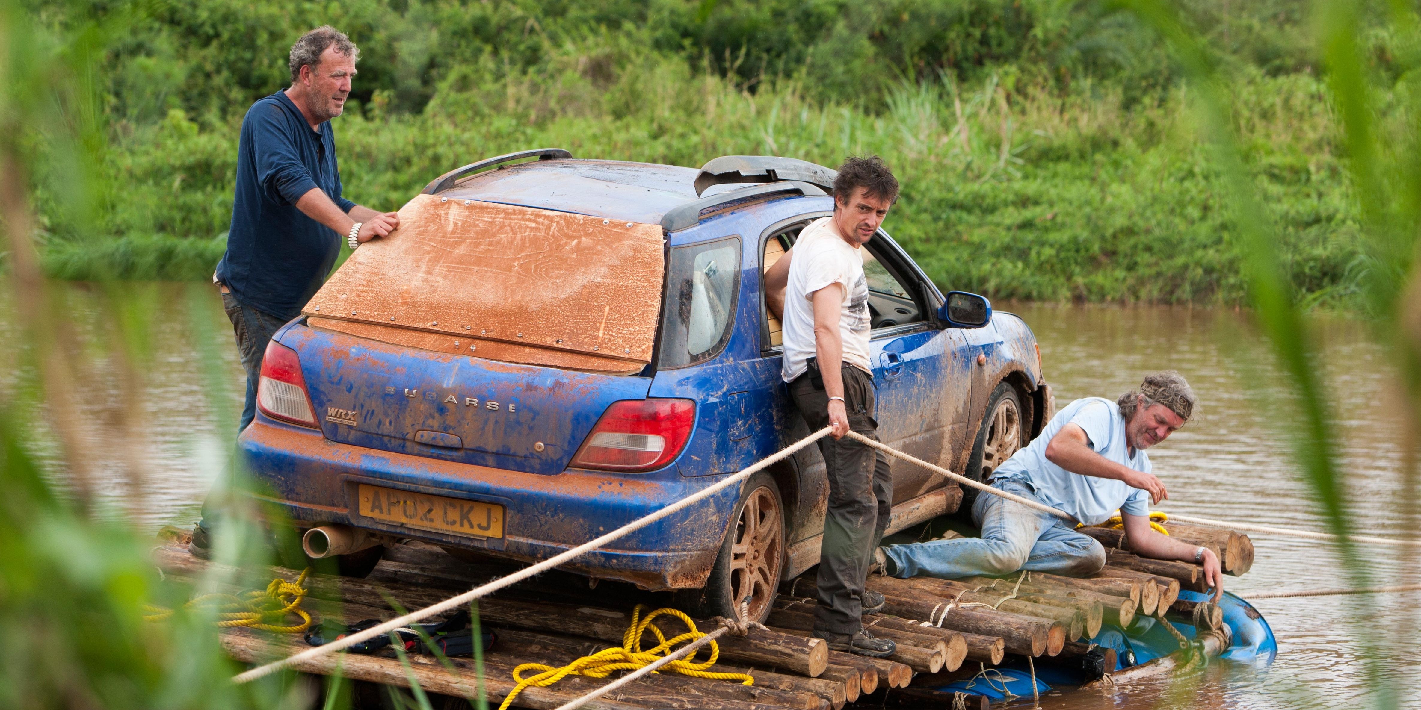 Jeremy Clarkson, Richard Hammond, and James May on the car raft with the Subaru in the Top Gear Africa Special
