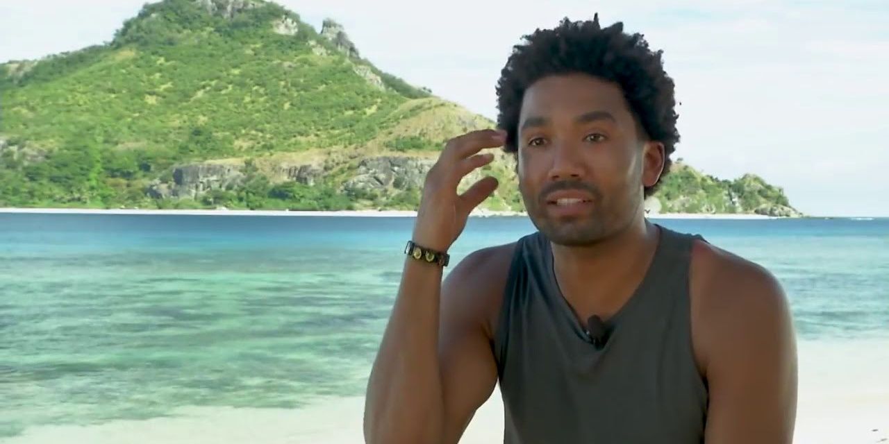 Wendell Holland talking to the camera on a beach in Survivor