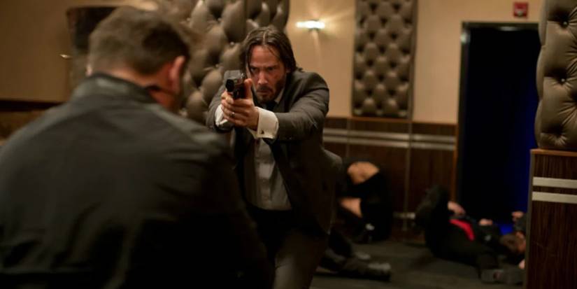 John Wick shoots a man in the head in John Wick
