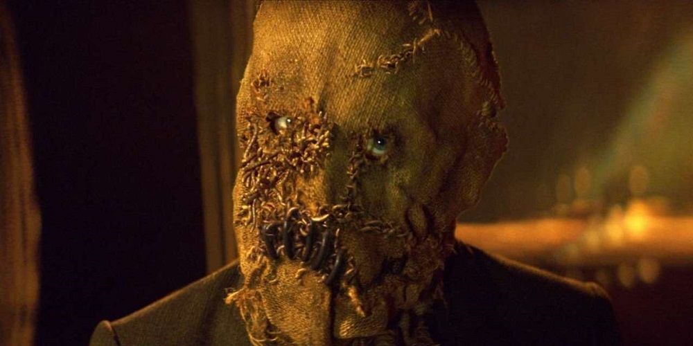 Cillian Murphy's character in Batman Begins wears a grotesque mask