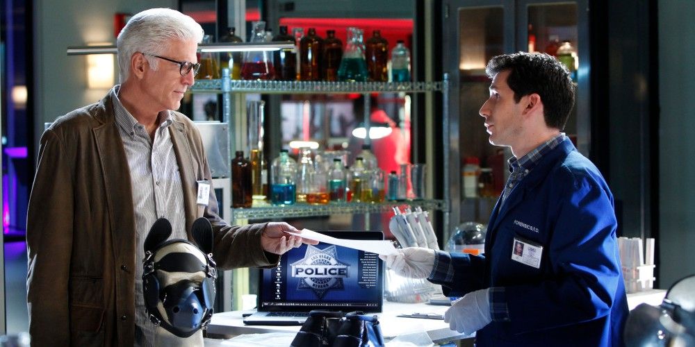 Ted Danson with another investigator in the lab, talking about something on CSI.