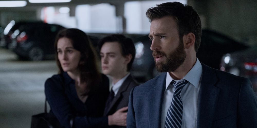 The Barber Family Standing In A Garage Looking Worried In Defending Jacob