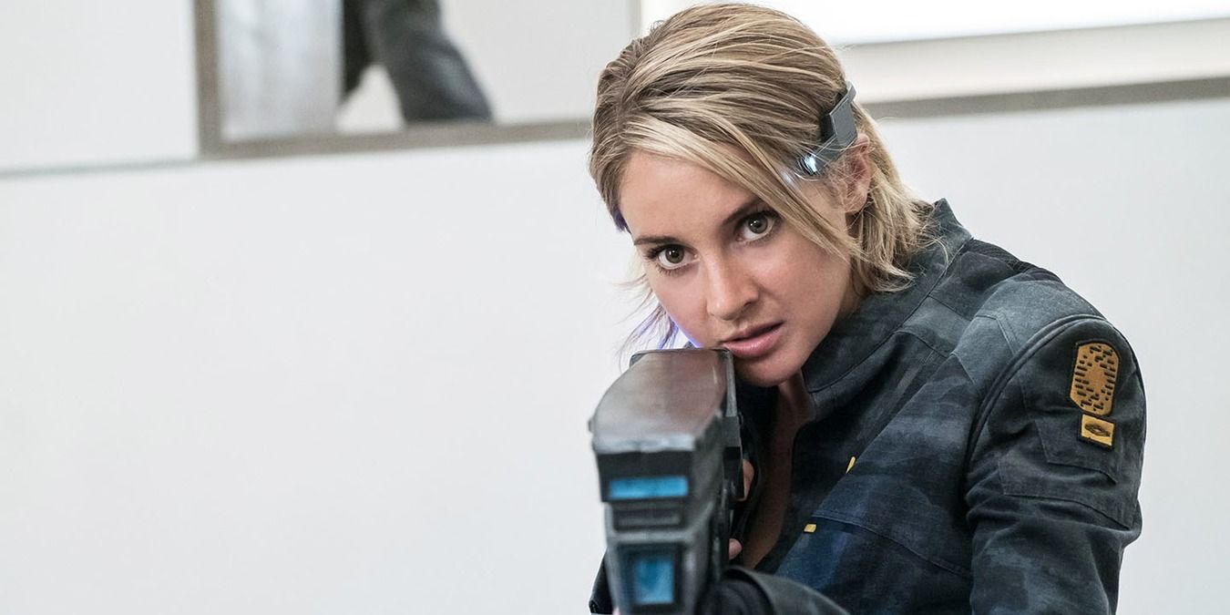 Shailene Woodley aims a weapon in Divergent