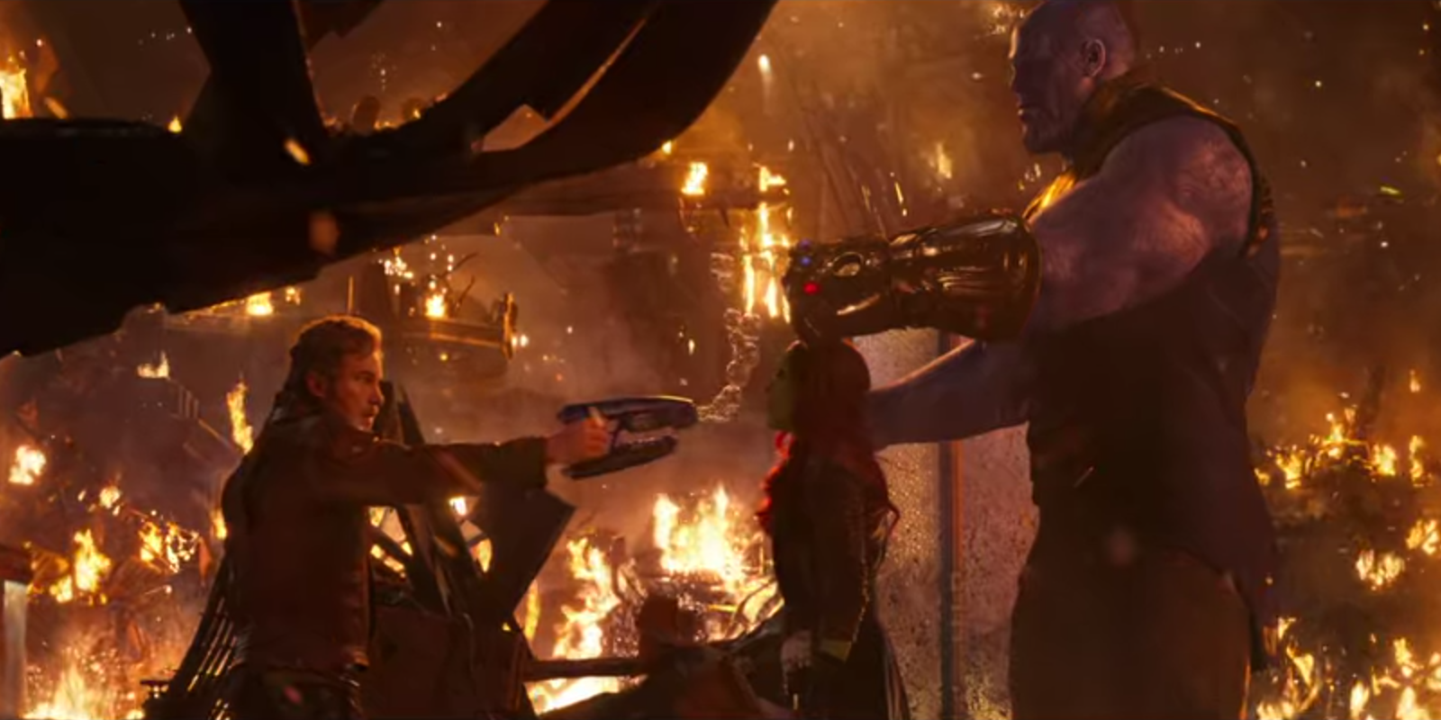 Quill points his blaster at Gamora and Thanos in Avengers Infinity War