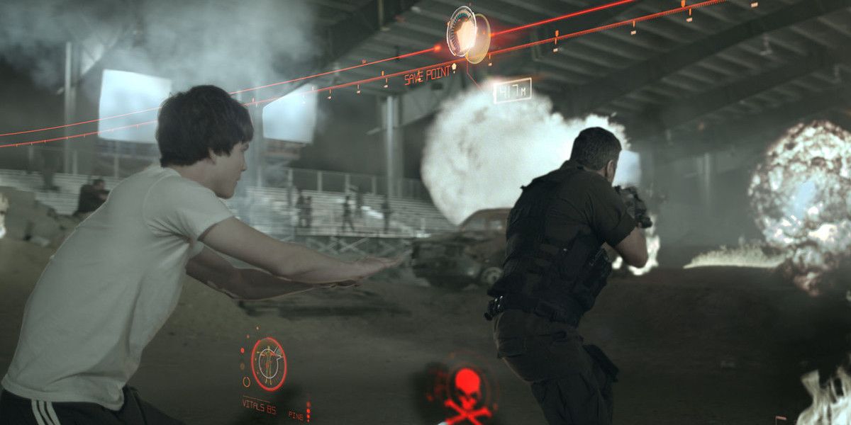 Logan Lerman controls Gerard Butler in a video game in Gamer
