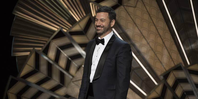 Jimmy Kimmel smiling as he hosts an awards show.
