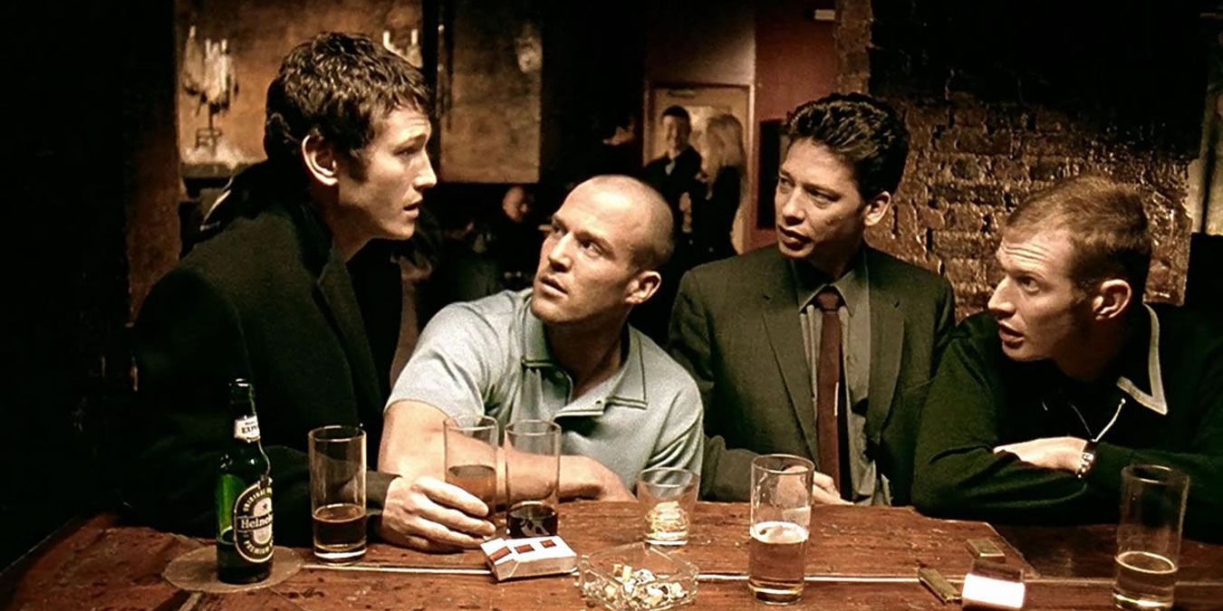 Four men talking in a pub in Lock, Stock, And Two Smoking Barrels
