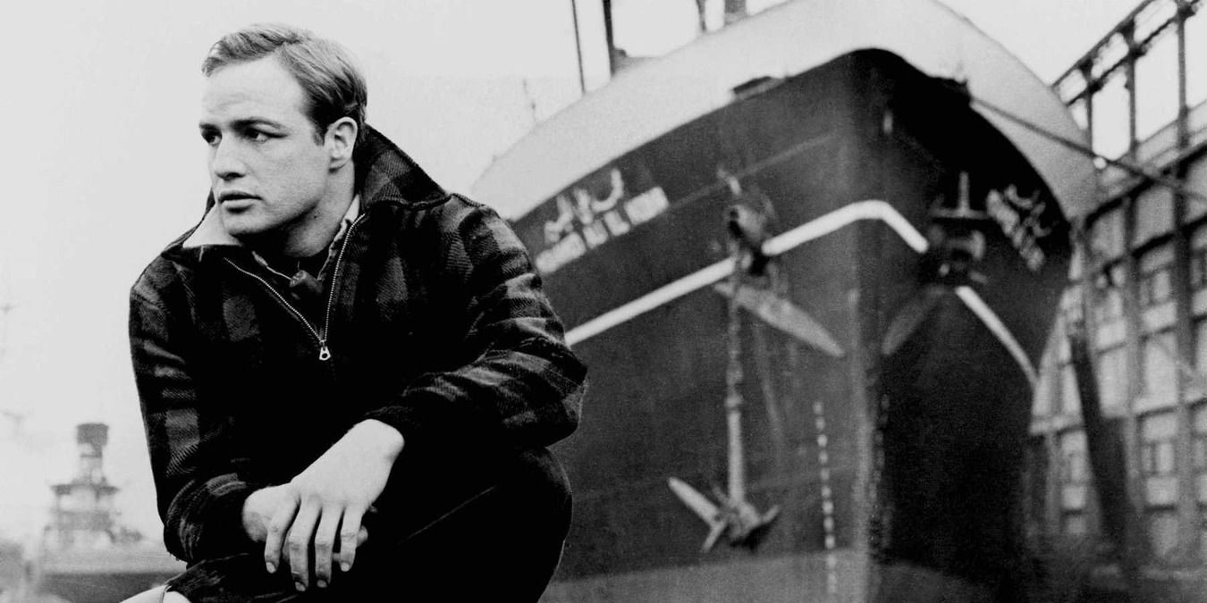 Terry in front of a ship in On The Waterfront