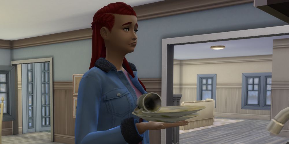A sim succumbing to starvation in The Sims 4.