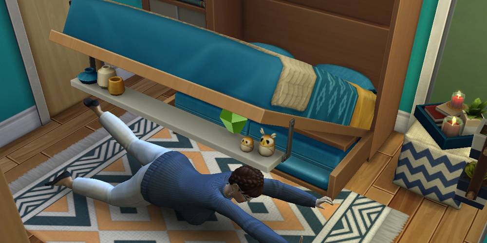 Um sim sendo morto por uma cama murphy no The Sims 4.