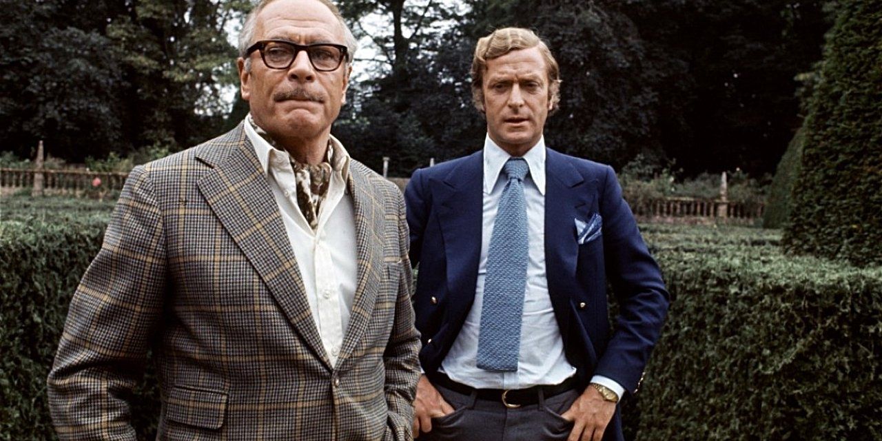 Laurence Olivier and Michael Caine in the garden in Sleuth